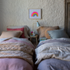 Linen Twin Duvet Cover | Linen duvet covers shown in kids' room on complementary side by side twin beds mixed with soft colors in cottons and linens.