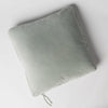 Harlow Throw Pillow | Eucalyptus | Cotton velvet 24 by 24 pillow on a plain background - overhead view.