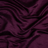 Paloma Bed Skirt | Fig | A close up of charmeuse fabric in fig, a richly saturated purple-garnet.