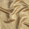 Taline Blanket | Honeycomb | A close up of charmeuse fabric in honeycomb, a warm golden tone.