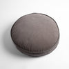 Harlow Throw Pillow | Fog | cotton velvet 18" diameter round pillow shot from overhead at a slight angle against a white background.