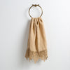 Frida Guest Towel | Honeycomb | Lace trimmed linen guest towel  draped through a decorative towel ring against a plain white background.