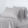 Linen Pillowcase (Single) | Fog | lace trimmed pillowcases shown with monochromatic bedding - side view.
