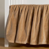 Harlow Crib Skirt | Honeycomb | cotton velvet crib skirt shown on a white crib .