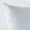 Ines Throw Pillow | Cloud | Close-up of pillow corner, showcasing the embroidery pattern detail.