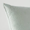 Ines Throw Pillow | Eucalyptus | Close-up of pillow corner, showcasing the embroidery pattern detail.