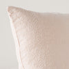 Ines Throw Pillow | Pearl | Close-up of pillow corner, showcasing the embroidery pattern detail.