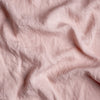 Linen Twin Duvet Cover | Rouge | A close up of linen fabric in rouge, a mid-tone blush pink.