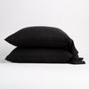 Linen Pillowcase (Single) | Corvino | Two sleeping pillows neatly stacked against a white background - side view.