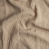 Linen Crib Sheet | Honeycomb | A close up of linen fabric in honeycomb, a warm golden tone.