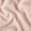 Signature Linen Swatch | Pearl | A close up of linen fabric in pearl, a nude-like, soft rose pink tone.
