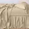 Linen Twin Bed Skirt | Honeycomb | bed skirt with matching rumpled sheets and sleeping pillows - side view.