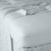 Linen Fitted Sheet | Cloud | close up of fitted sheet with matching rumpled flat sheet - corner view.