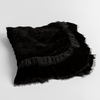 Loulah Baby Blanket | Corvino | an overhead shot of a folded silk velvet baby blanket with a raw-edged eyelash ruffle detail.