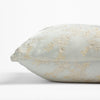 Lynette Throw Pillow | Winter White | side view of pillow showing front and back, straight on against a white background.