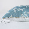 Lynette Throw Pillow | Cloud | Close-up side vew featuring brass zipper with charmeuse pull and linen back.