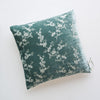 Lynette Throw Pillow | Eucalyptus | pillow against a plain background - overhead view.