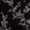 Lynette Blanket | Moonlight | A close up of embroidered silk velvet fabric in moonlight, a saturated, cool, mid-dark grey tone.
