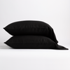 Madera Luxe Pillowcase (Single) | Corvino | sleeping pillows stacked neatly against a white backdrop - side view.