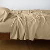 Madera Luxe Fitted Sheet | Honeycomb | fitted sheet with matching rumpled flat sheet and sleeping pillow - side view.