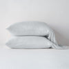 Madera Luxe Pillowcase (Single) | Cloud | sleeping pillows stacked neatly against a white backdrop - side view.