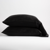 Paloma Pillowcase (Single) | Corvino | two sleeping pillows neatly stacked on white background.