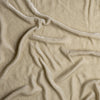 Carmen Baby Blanket | Parchment | A close up of silk velvet fabric in parchment, a warm, antiqued cream.