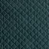 Silk Velvet Quilted Coverlet | Eucalyptus | A close up of quilted silk velvet fabric in eucalyptus, a soft light green.