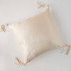 Taline Throw Pillow | overhead view on white background - pearl.