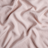Madera Luxe Twin Duvet Cover | Rouge | A close up of tencel™ fabric in rouge, a mid-tone blush pink.
