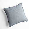 Vienna Throw Pillow | Cloud | cotton chenille jacquard 18x18 pillow shown from overhead to display the pillow's face and silk velvet trim — overhead against a white background.