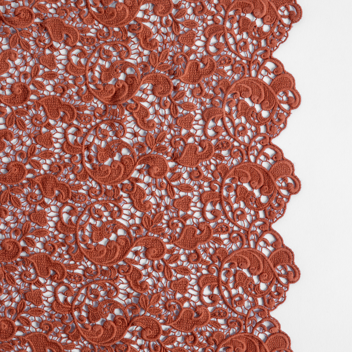 Allora Bed Scarf | Autumn | A close-up of Allora fabric in the colorway, Autumn, a rich terracotta tone.
