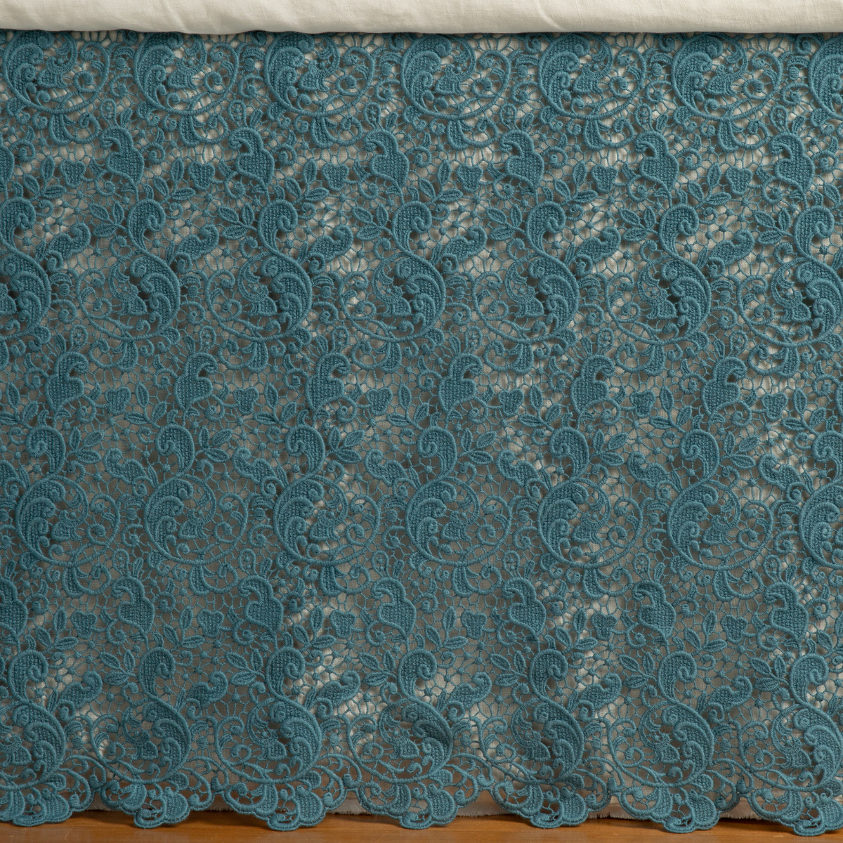 Allora Bed Skirt | Cenote | a close up of a cotton lace bed skirt layered over a winter white bed skirt - shot straight at the bed skirt.