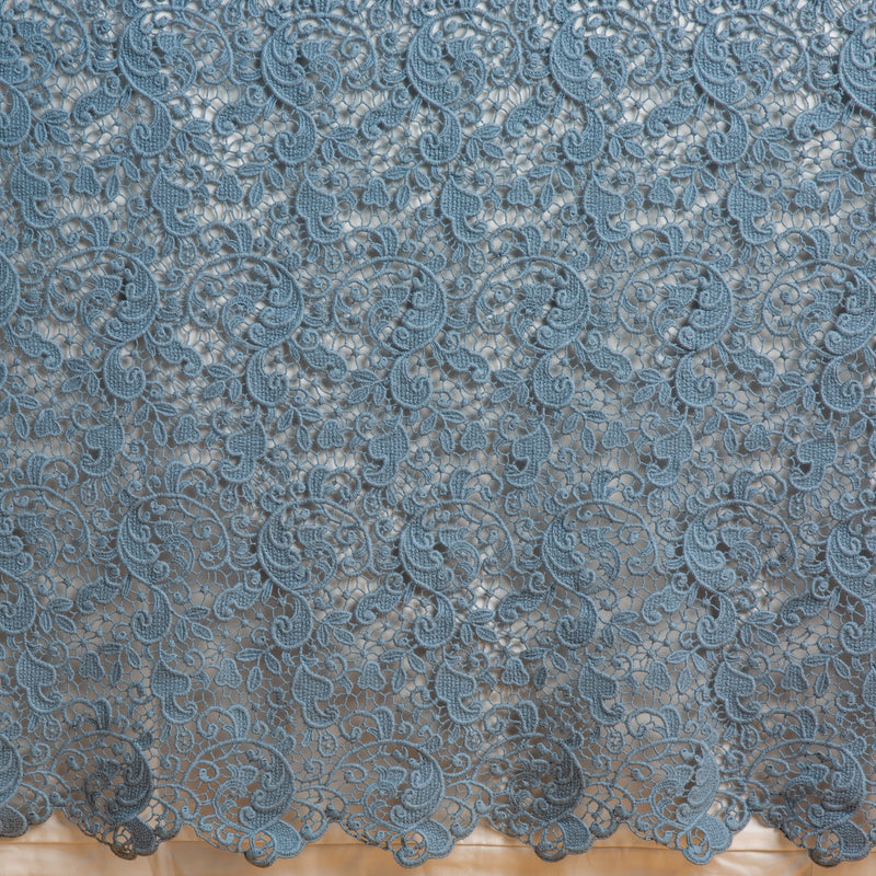 Allora Bed Skirt | Tahoe Blue | a close up of a cotton lace bed skirt layered over a winter white bed skirt - shot straight at the bed skirt.