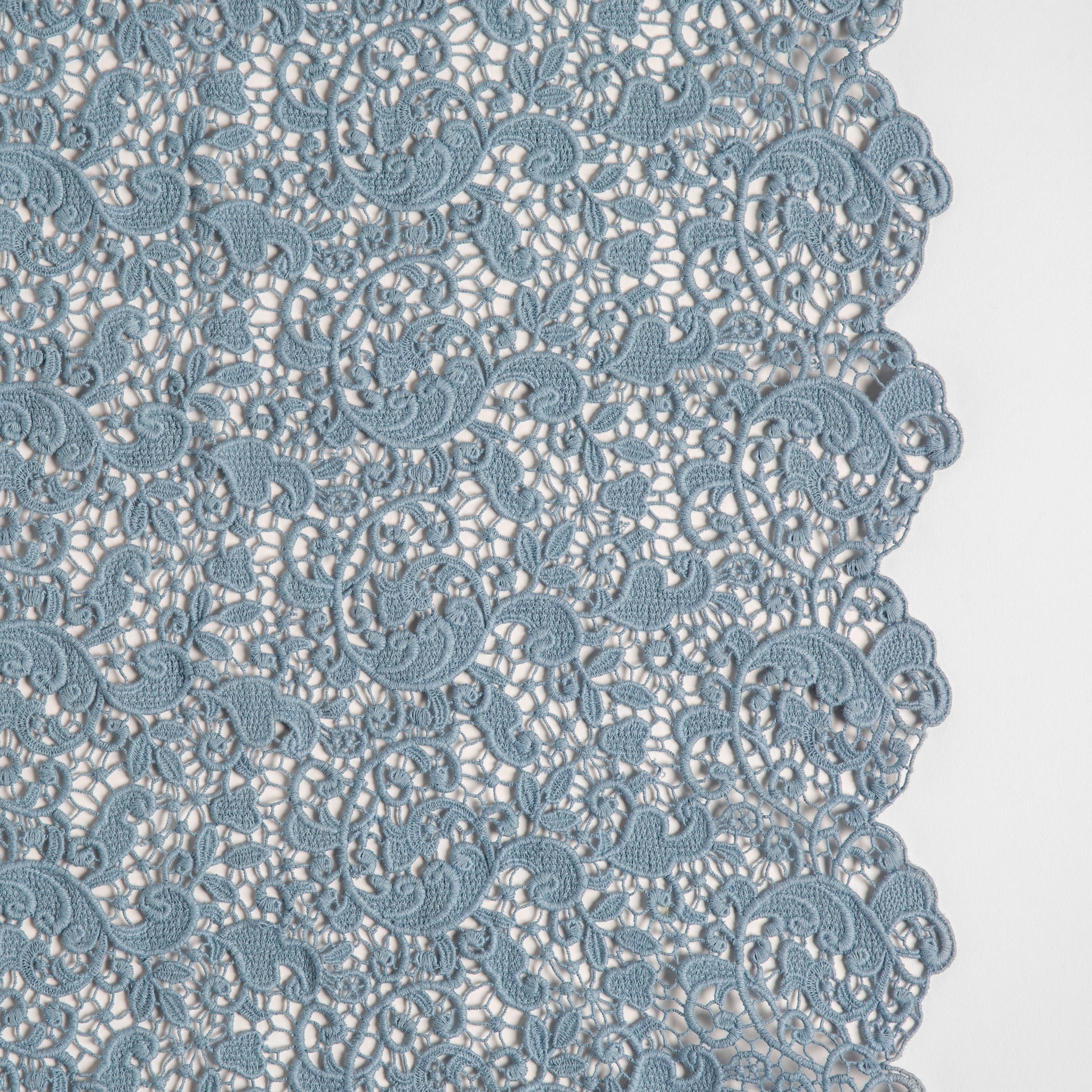 Allora Bed Scarf | Tahoe Blue | a close up of cotton all-over lace with a scalloped edge.