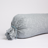 Allora Lace Throw Pillow | Cloud | one end of a lace boslter cover on a winter white liner against a white background.