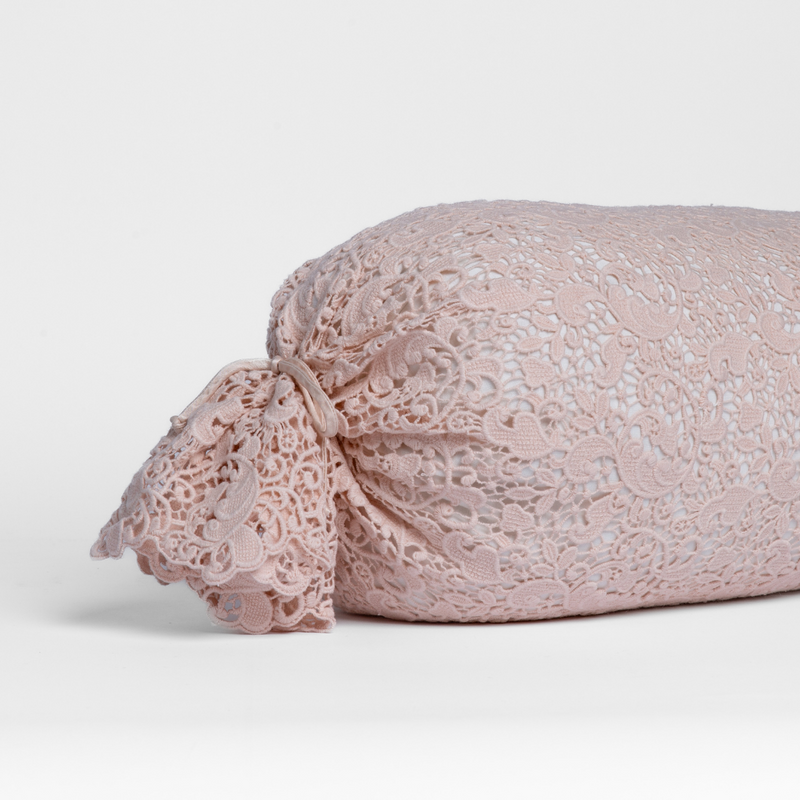 Allora Lace Throw Pillow | Pearl | one end of a lace boslter cover on a winter white liner against a white background.