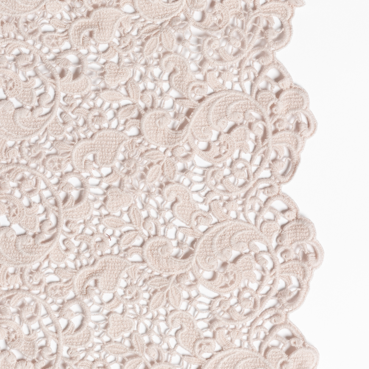 Allora Bed Scarf | Pearl | a close up of cotton all-over lace with a scalloped edge.