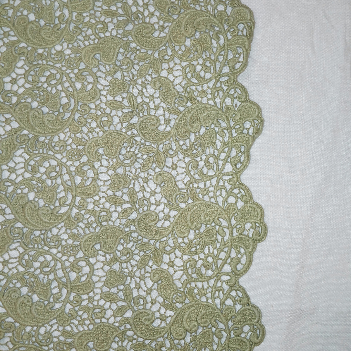 Allora Bed Scarf | Desert Sage | close-up of allora lace in desert sage, a serenely elegant green, offering a hushed hue.