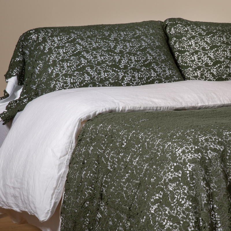 Allora Lace Pillowcase (Single) | Juniper | a pair of cotton lace pillowcase covers on winter white liners shown on a bed dressed in winter white linen with a matching cotton lace bed scarf.