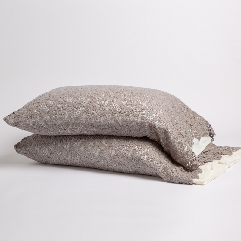Allora Lace Pillowcase (Single) | Moonlight | a pair of stacked cotton lace pillowcase covers on winter white liners against a white background.