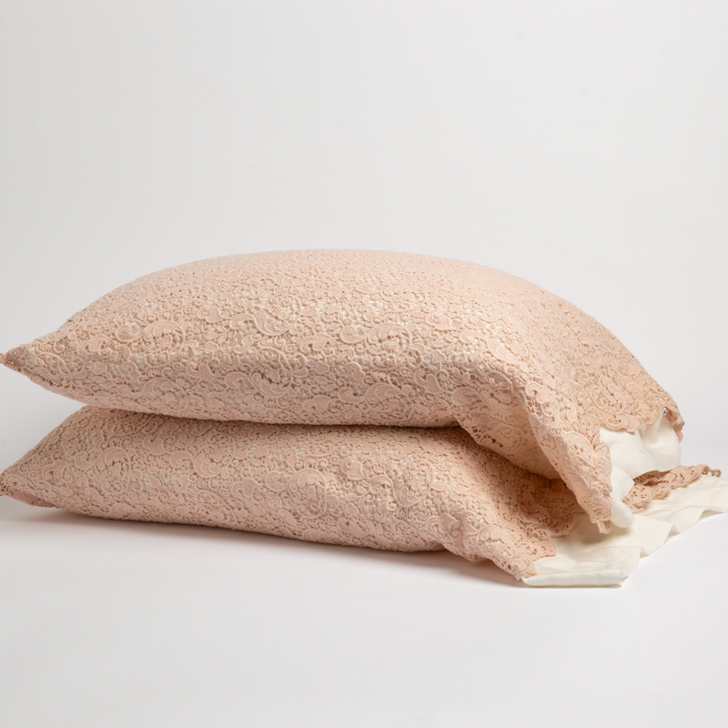 Allora Lace Pillowcase (Single) | Pearl | a pair of stacked cotton lace pillowcase covers on winter white liners against a white background.