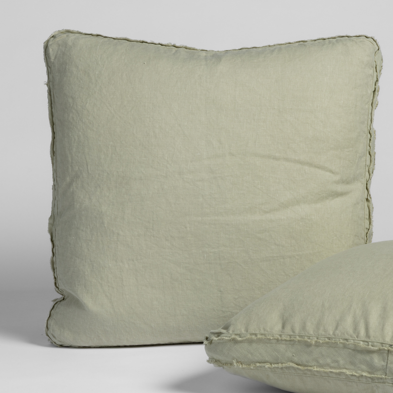Austin Sham | Desert Sage | matching shams in desert sage, a serenely elegant green, offering a hushed hue, shown against a plain background.