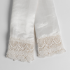 Paloma with Mattine Lace Pillowcase (Single) | White | two folded pillowcases slightly crossed and shot from overhead to show the lace detail against a white background.