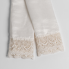 Paloma with Mattine Lace Pillowcase (Single) | Winter White | two folded pillowcases slightly crossed and shot from overhead to show the lace detail against a white background.
