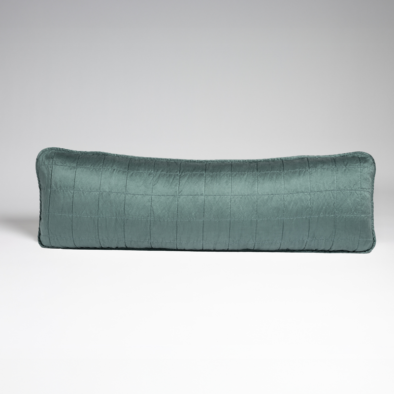Sel Throw Pillow | Cenote | A straight-on shot of a square-quilted body pillow in cenote, a vibrant ocean-inspired blue-green, against a white background.