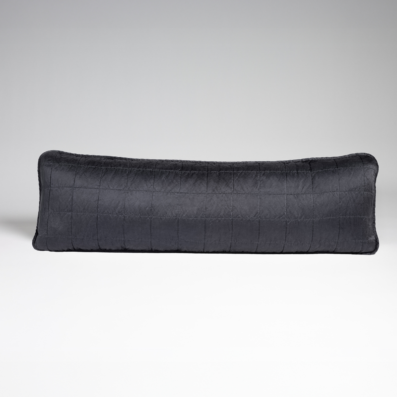 Sel Throw Pillow | Midnight | A straight-on shot of a square-quilted body pillow in midnight, a rich indigo tone, against a white background.