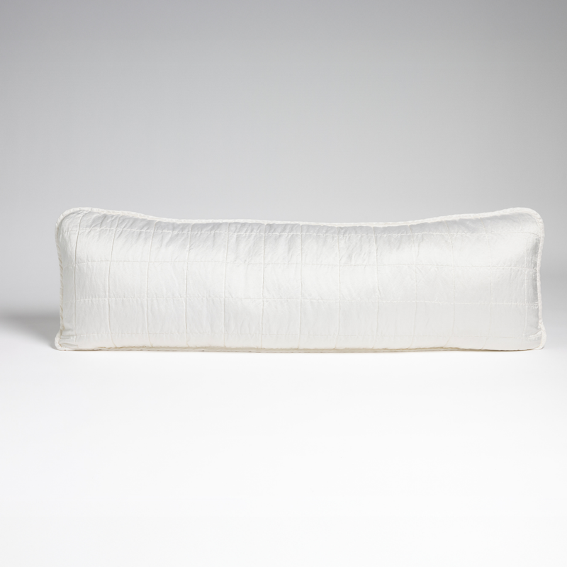 Sel Throw Pillow | White | A straight-on shot of a square-quilted body pillow in classic white, against a white background.