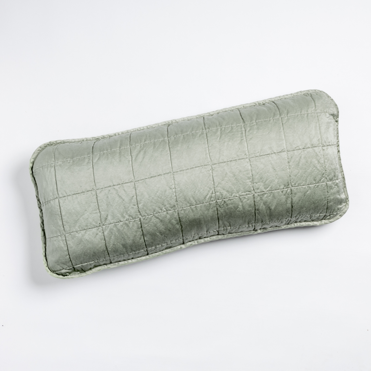 Sel Throw Pillow | Eucalyptus | An overhead shot of a square-quilted rectangle throw pillow in eucalyptus, a soft light green, against a white background.