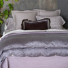 Allora Lace Pillowcase (Single) | cotton lace pillowcase covers staggered with monochromatic shams on a monochromatic bed shot from the end of bed view.